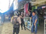 Patroli Presisi Sat Samapta Polres Lampung Utara Beri Imbauan kepada Pedagang di Pasar Dekon Kotabumi