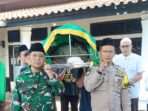 Bhabinkamtibmas Polsek Kotabumi Kota Melayat Kepala Desa Bandar Putih